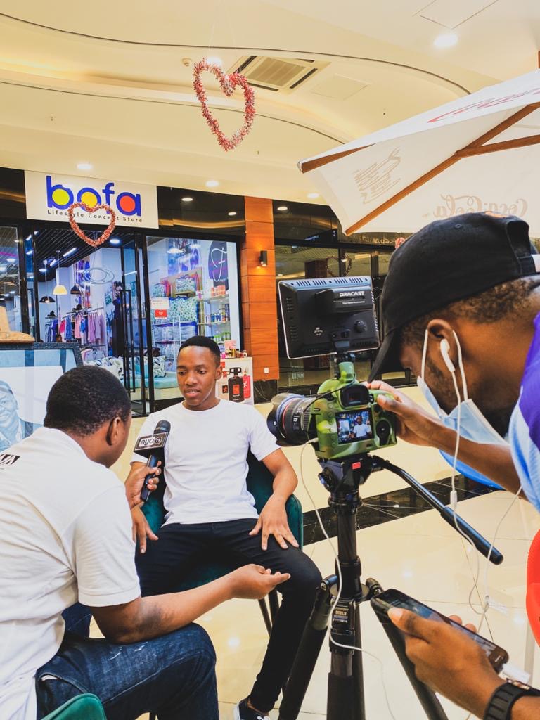 Moses Mwansasu being interviewed
